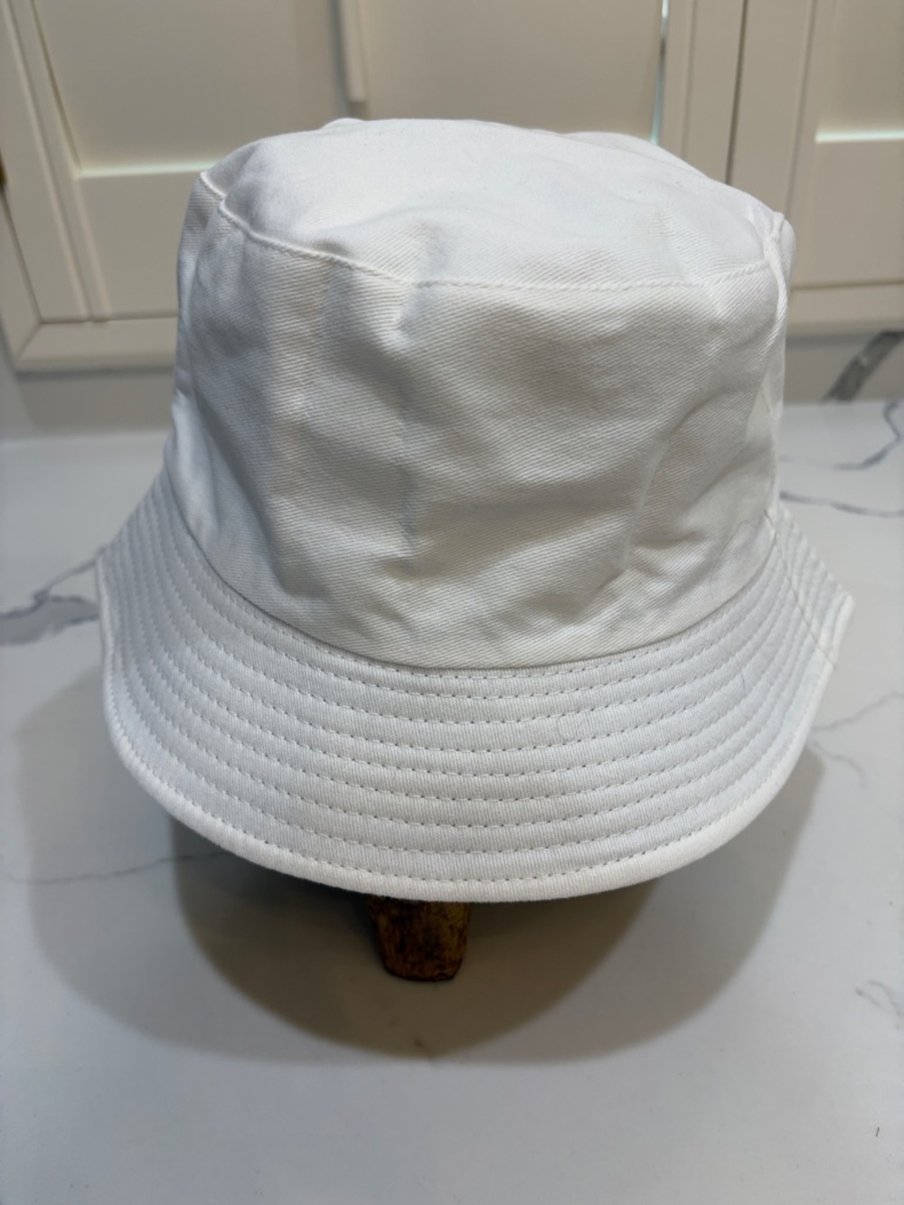 White bucket hat